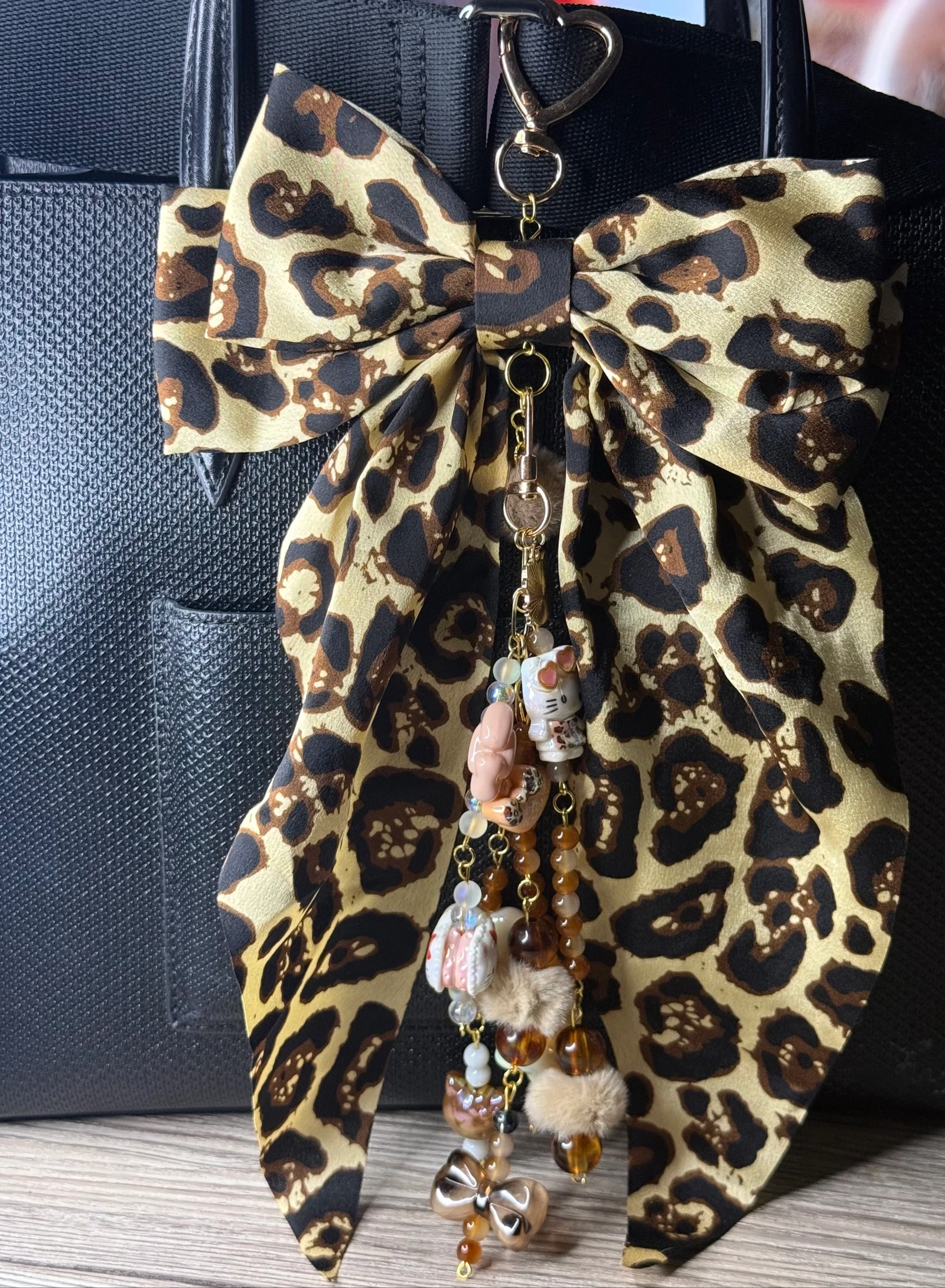 Bijou sac léopard fait main 